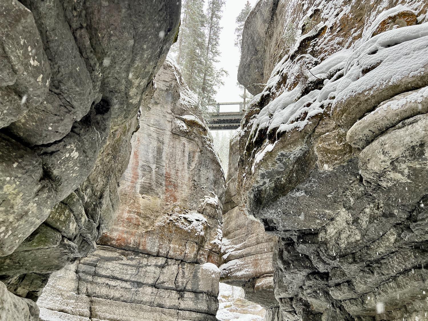 From the Maligne Canyon floor in winter, a view of one of the historic bridges.