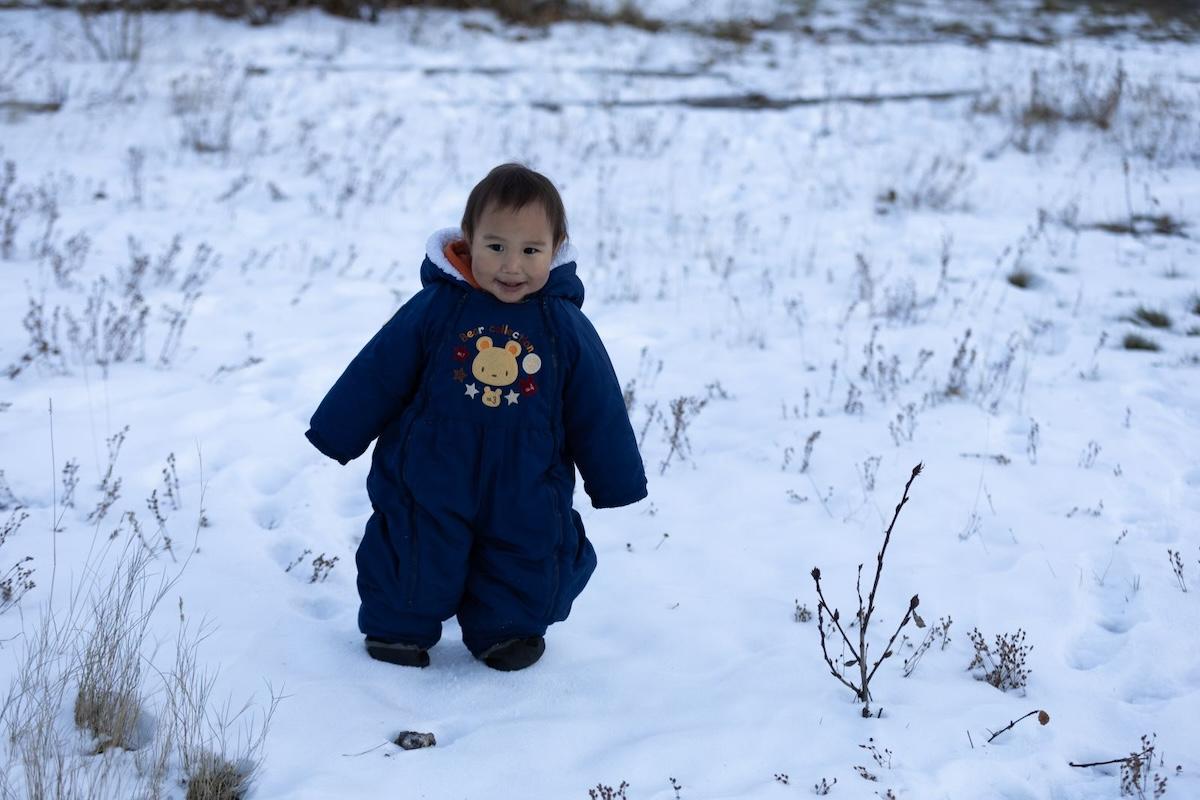 Samuel, just 18 months old and from the Sipmcw First Nation, reconnects with the land in Jasper National Park.