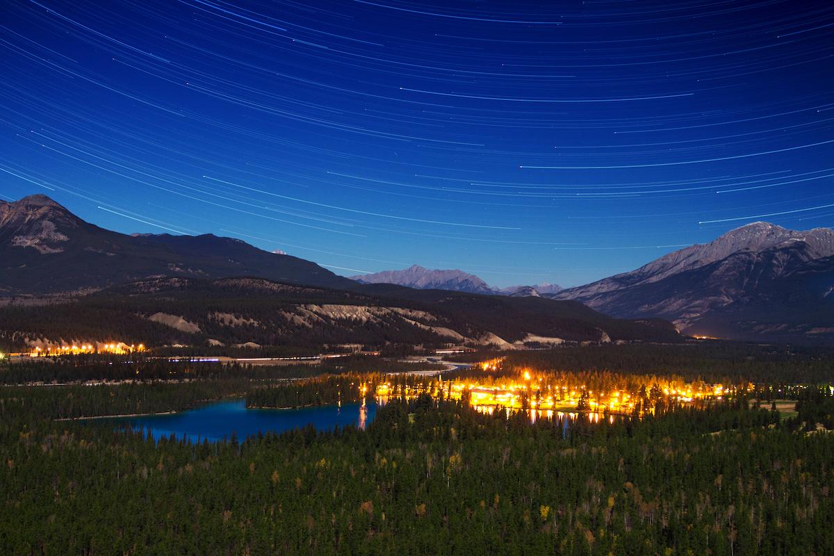 The night sky over the town of Jasper in Jasper National Park.