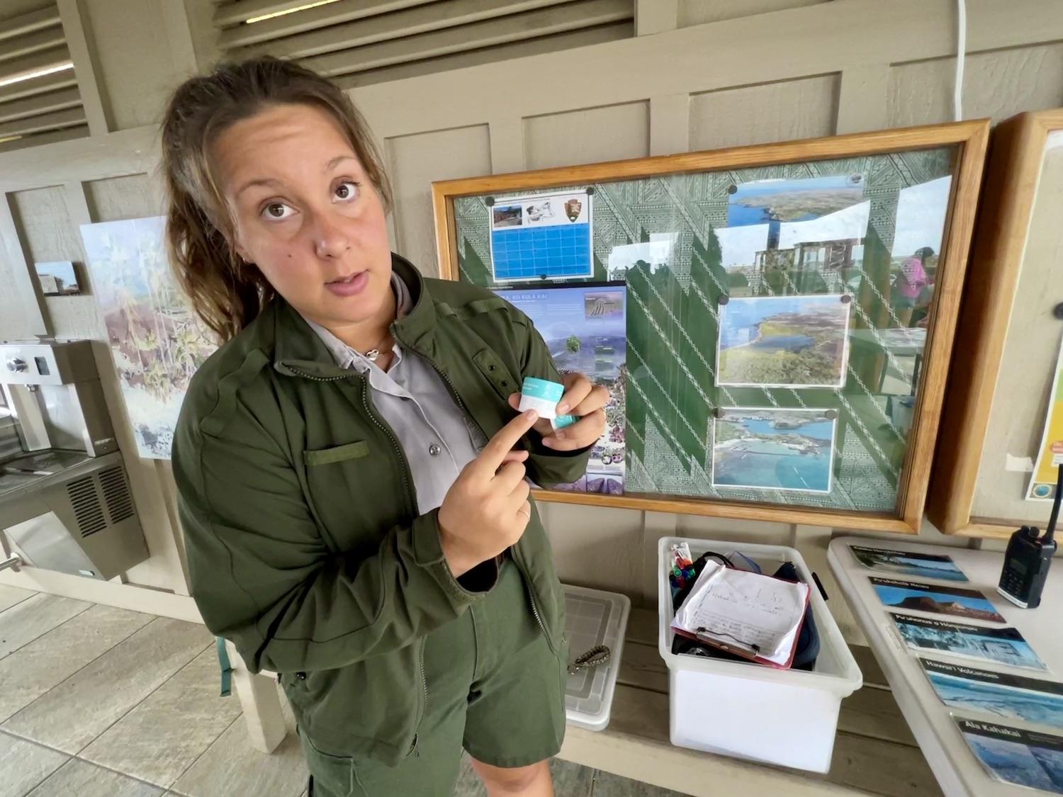 Ranger Emily Bankston shows a sample of reef-safe mineral sunscreen at Kaloko-Honokōhau National Historical Park.