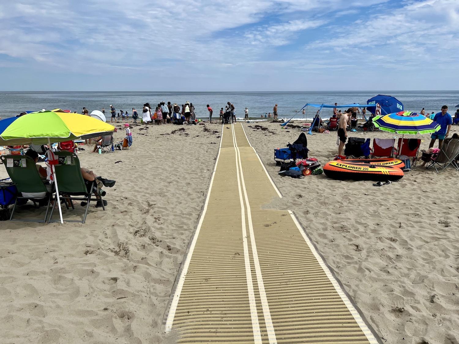 Kellys Beach is a big draw at Kouchibouguac and it has a special mat that allows wheelchairs to move across the sand to the water.