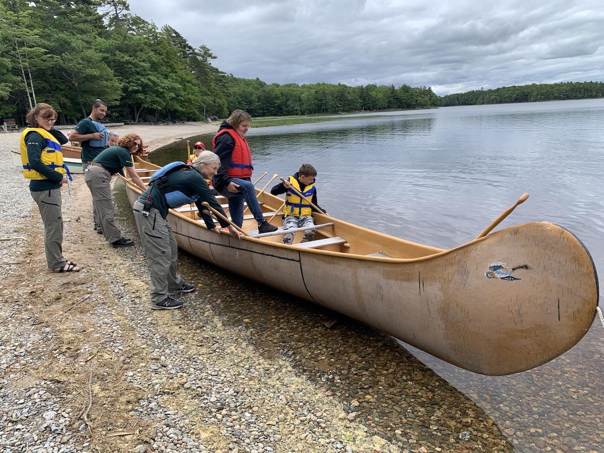 Parks Canada staff prepare the "Big Canoe" for Keji visitors on National Indigenous Peoples Day. Parks Canada staff prepare the "Big Canoe" for Keji visitors on National Indigenous Peoples Day.