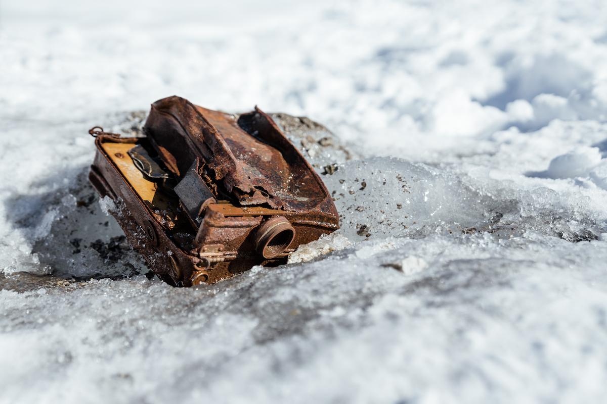 A DeVry "Lunchbox" model motion picture camera discovered on Walsh Glacier in Kluane National Park and Reserve. 