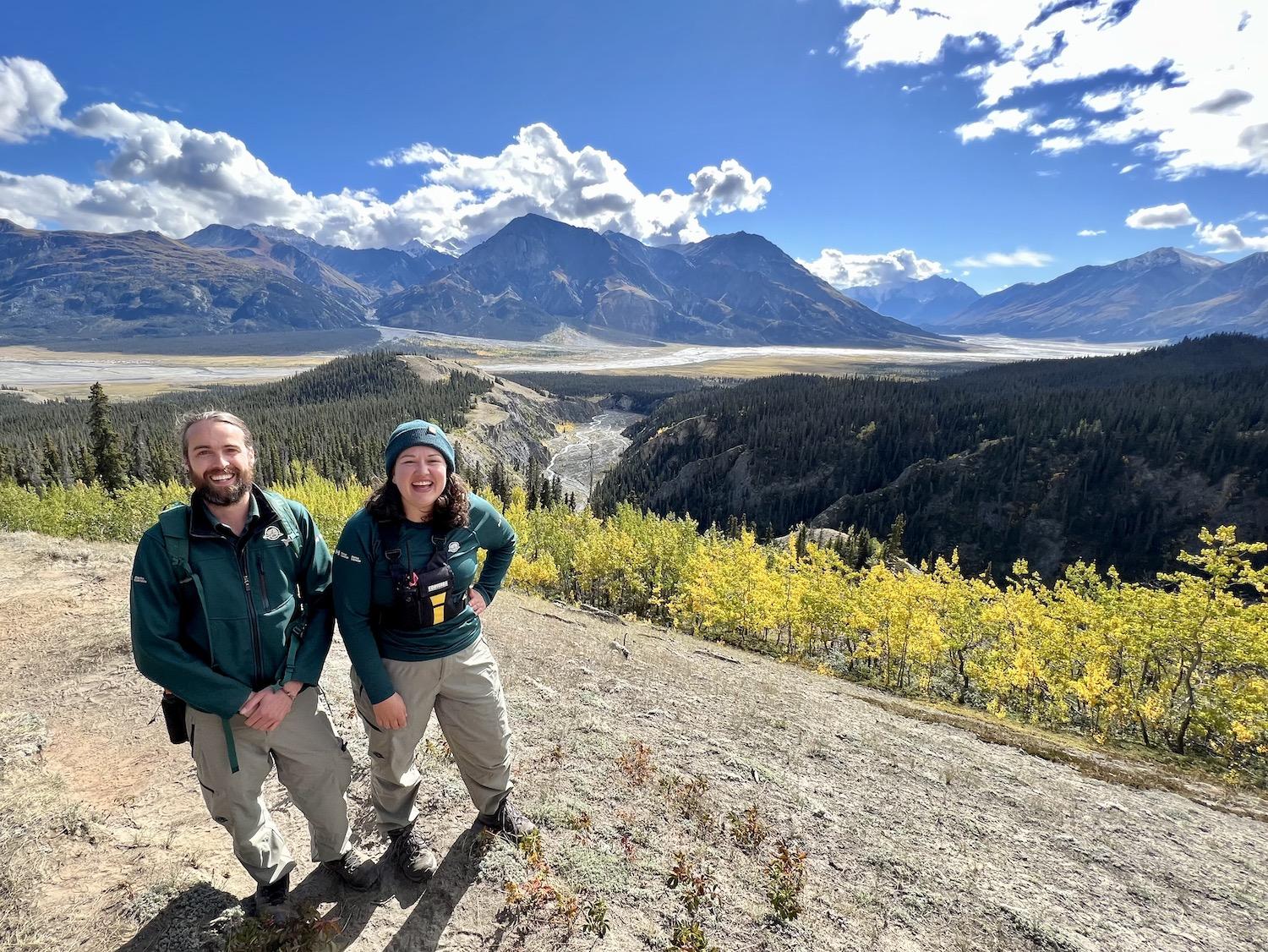 Parks Canada's Logan McKillop and Rachelle Linde stand at the first viewpoint on Kluane's Sheep Creek Trail.