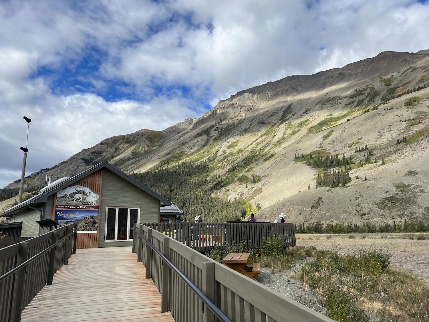 The Thechàl Dhâl' Visitor Centre has spotting scopes on a viewing platform below a mountain where Dall's sheep congregate. 