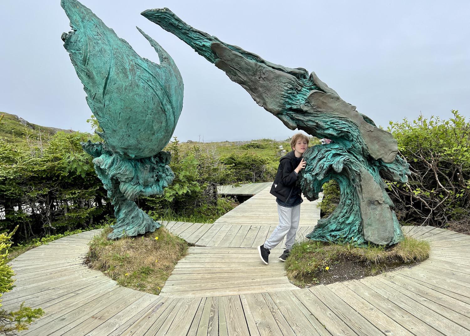 The Meeting of Two Worlds sculpture represents Indigenous and European cultures finally meeting near L'Anse aux Meadows as humans finally circumnavigated the globe.