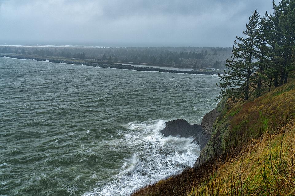 A windy, stormy view of the Waikiki Beach jetty from the Louis and Clark Interpretive Center, Cape Disappointment State Park, Louis and Clark National Historic Trail / Rebecca Latson