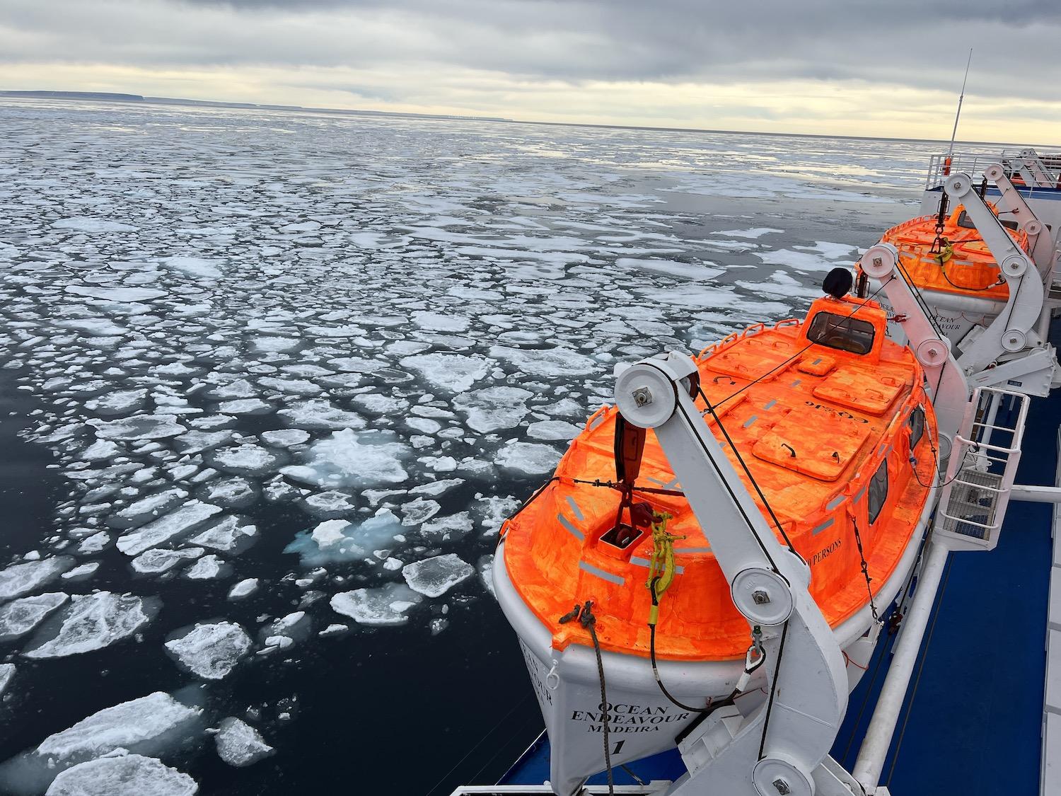 Lifeboats aboard the Ocean Endeavour as she sails through sea ice in Lancaster Sound, Nunavut. Lifeboats aboard the Ocean Endeavour as she sails through sea ice in Lancaster Sound, Nunavut.