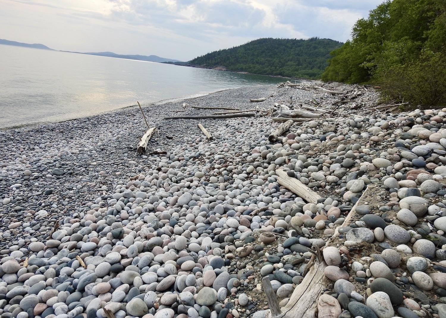 People are drawn to Pebble Beach at Marathon to see rocks, pebbles and driftwood that have been smoothed by pounding waves from Lake Superior.