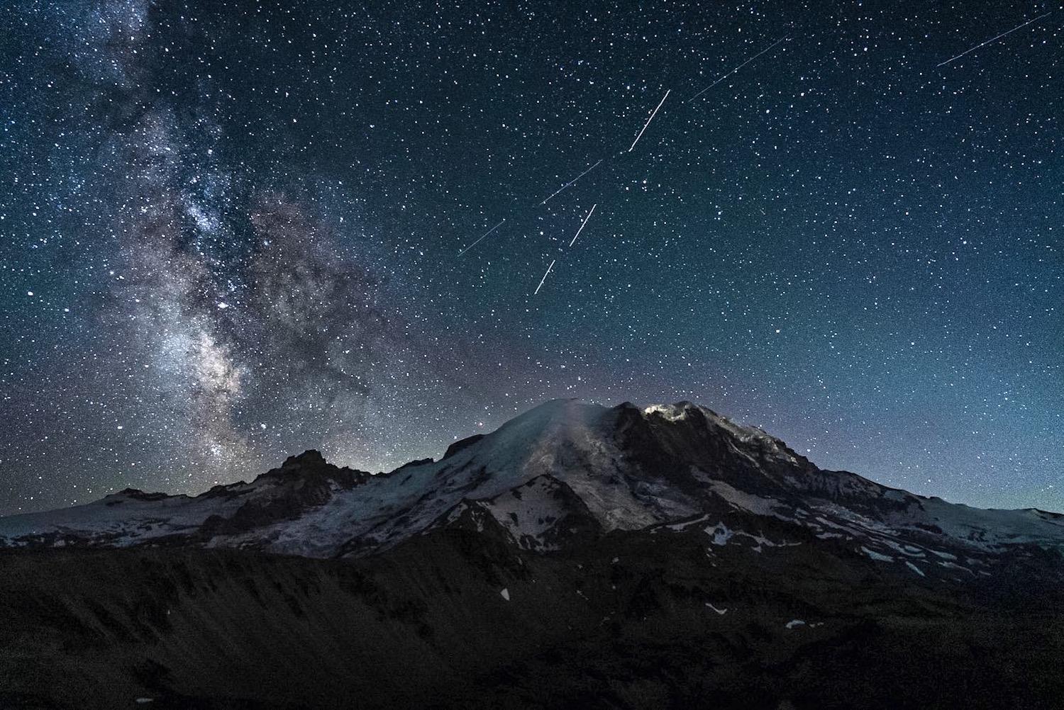 The Milky Way shines above Mount Rainier/Taylor Newlun.