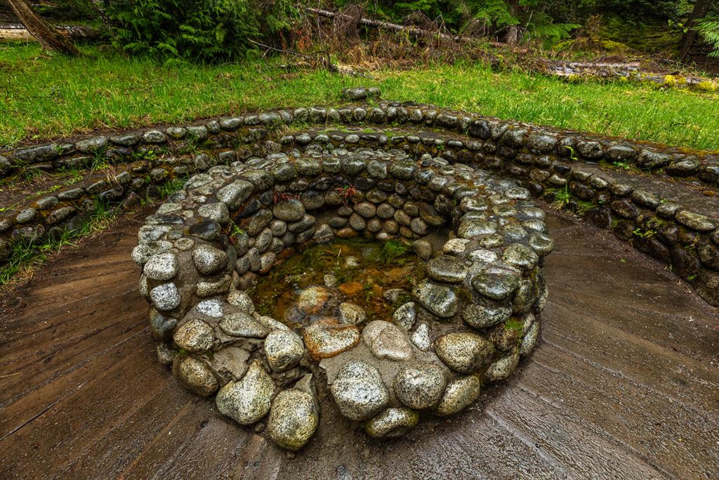 Rock arcs and a rock circle at a bubbling mineral spring, Mount Rainier National Park / Rebecca Latson