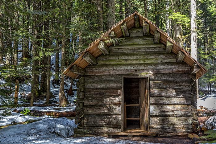 A cabin in the woods along the Trail of the Shadows, Mount Rainier National Park / Rebecca Latson