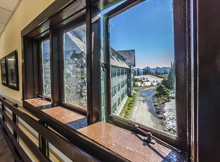 A view of the Annex through the breezeway window at the Paradise Inn, Mount Rainier National Park / Rebecca Latson