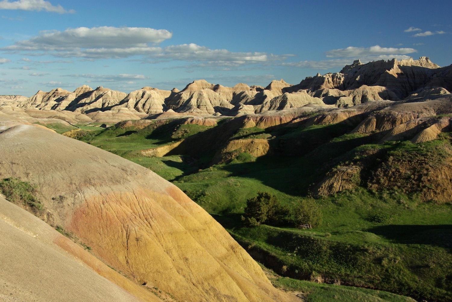The rumpled landscape of Badlands National Park draws visitors who like to view it from overhead/NPS file. Larry McAfee