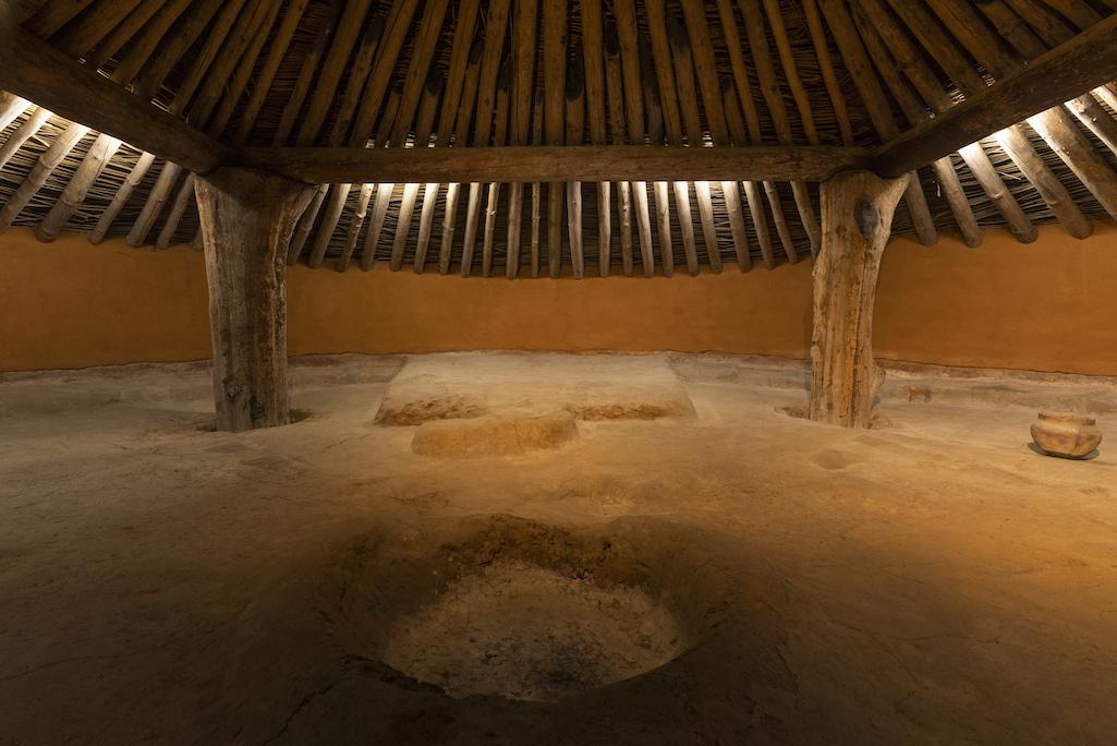 The Earth Lodge, dated to 1015 AD, was built by the Mississippian culture and later restored from archaeological evidence and is part of Ocmulgee National Historical Park.