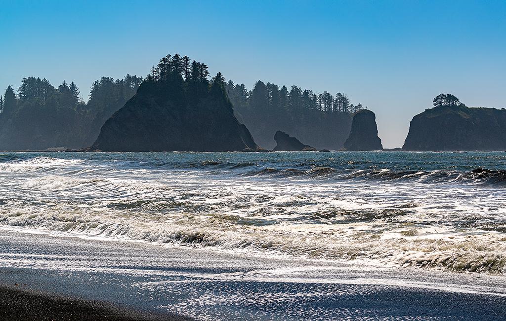 A telephoto landscape of Rialto Beach sea stacks, Olympic National Park / Rebecca Latson