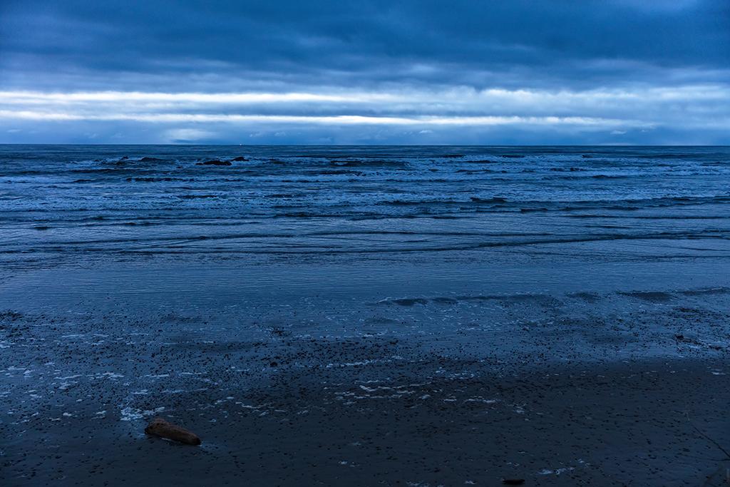 A stormy winter sunset over Kalaloch Beach - non-silky water, Olympic National Park / Rebecca Latson