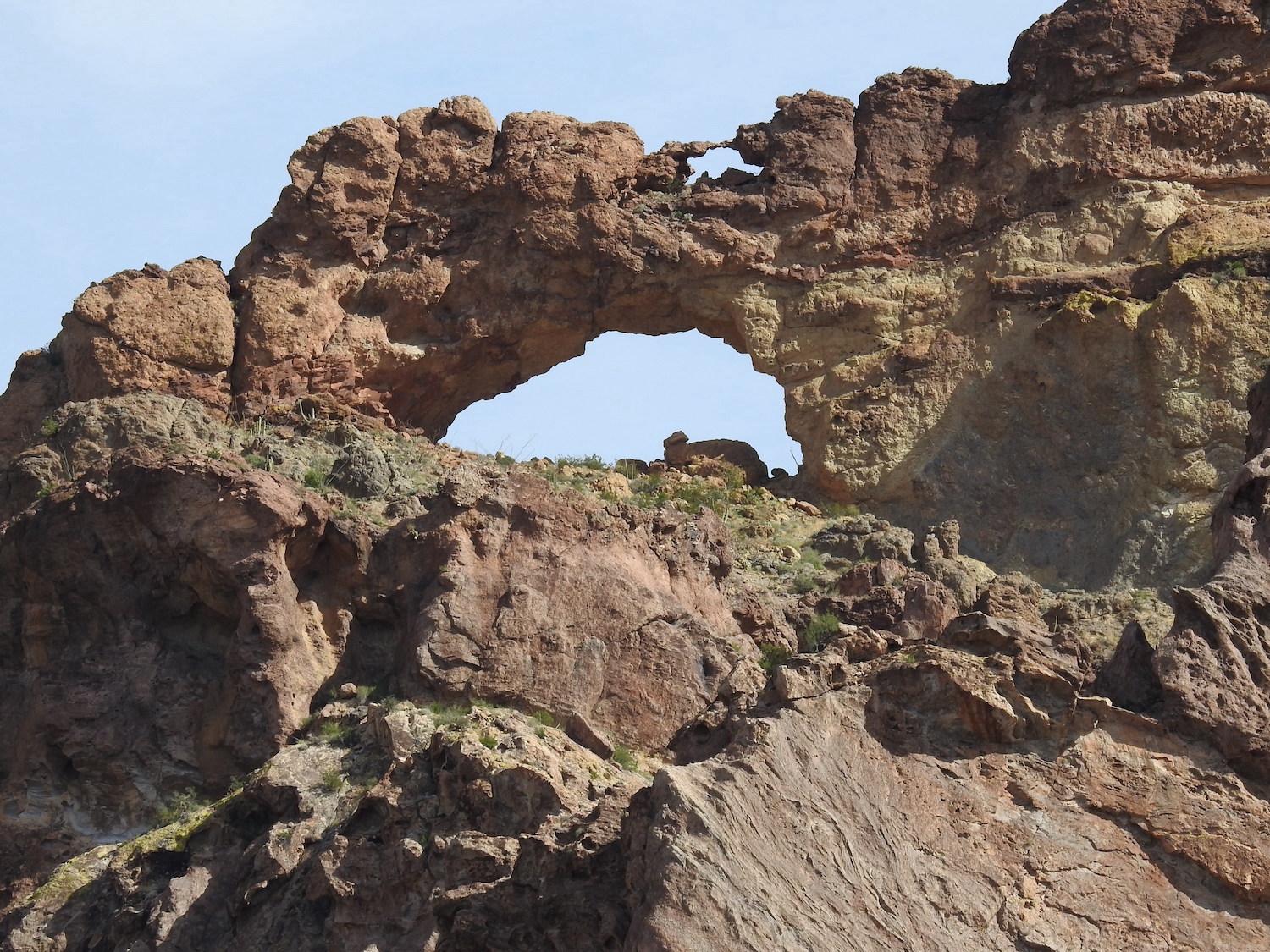 The famous double arch at Arch Canyon is visible from the trailhead parking lot.