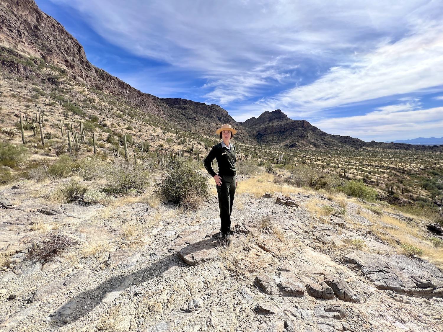 Organ Pipe Cactus National Monument ranger Cate Blanch stands at a popular picnic spot along Ajo Mountain Drive in the &quot;green desert&quot; of southwestern Arizona.