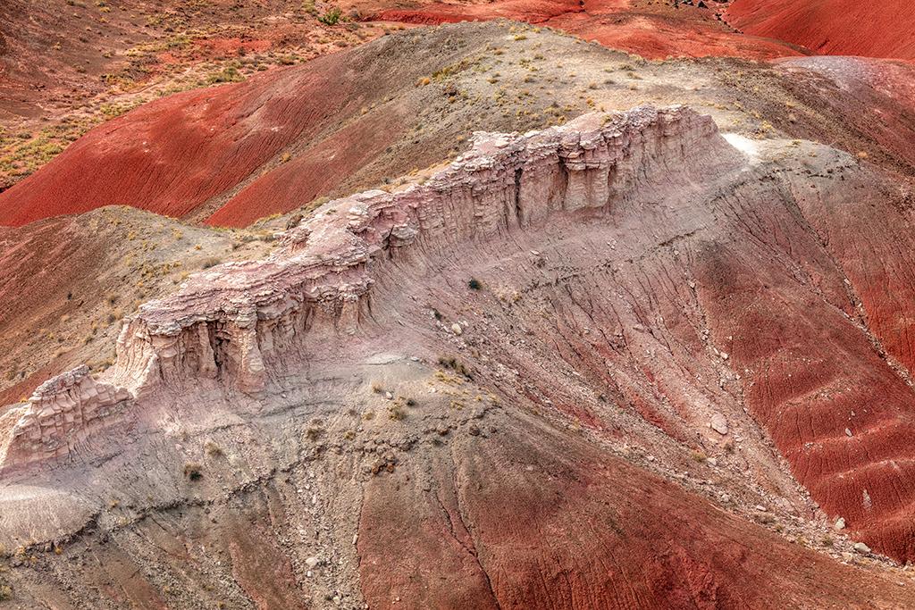 A telephoto landscape of Painted Desert, Petrified Forest National Park / Rebecca Latson