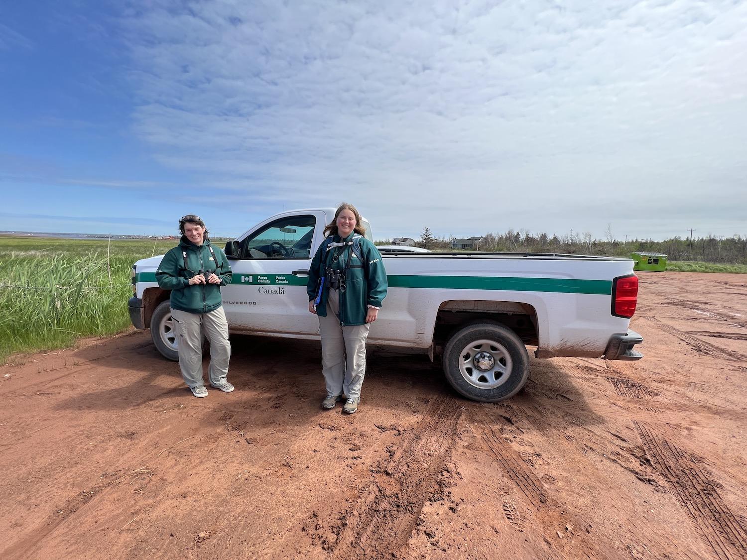 Parks Canada's Stacey Evans and Lily McLaine are shown in Prince Edward Island National Park near a protected Piping Plover nesting area.