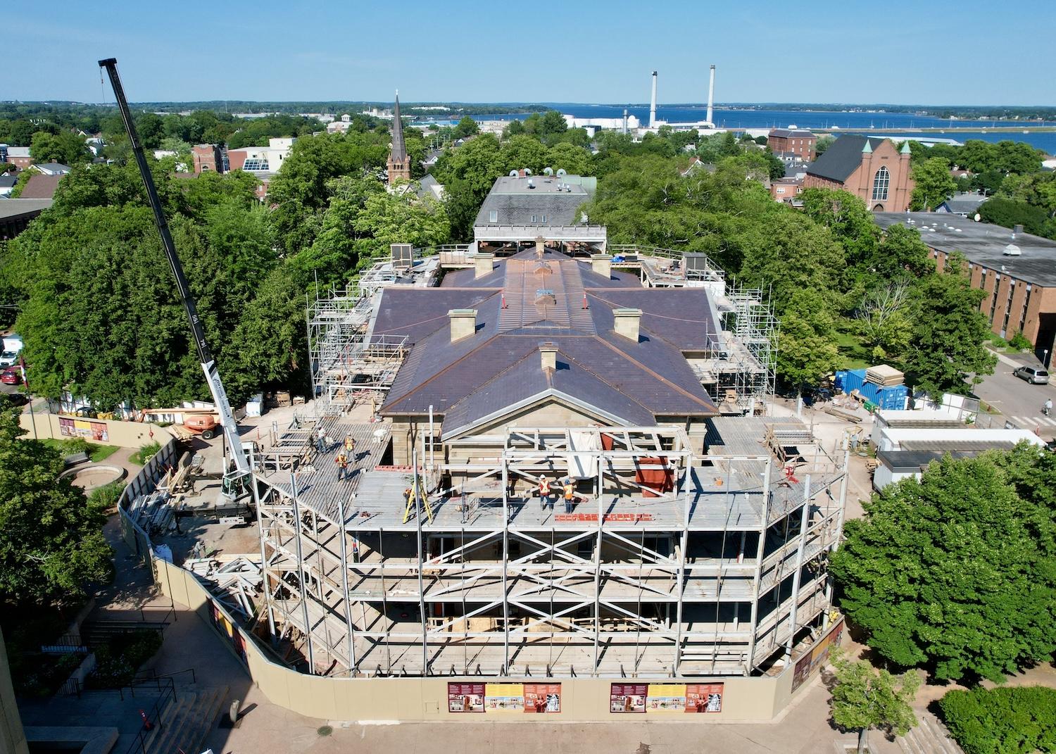A drone image of Province House National Historic Site while still surrounded by the exoskeleton that provided an essential and safe work platform for the project team. 
