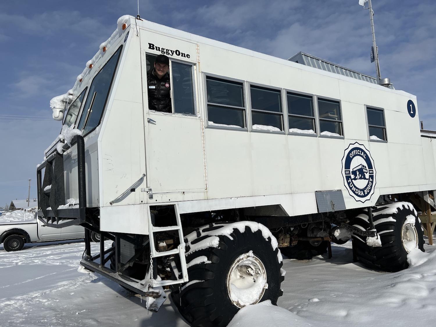 Kieran McIver, manager of Churchill field operations for Polar Bears International, shows off the Tundra Buggy that's used for research purposes.