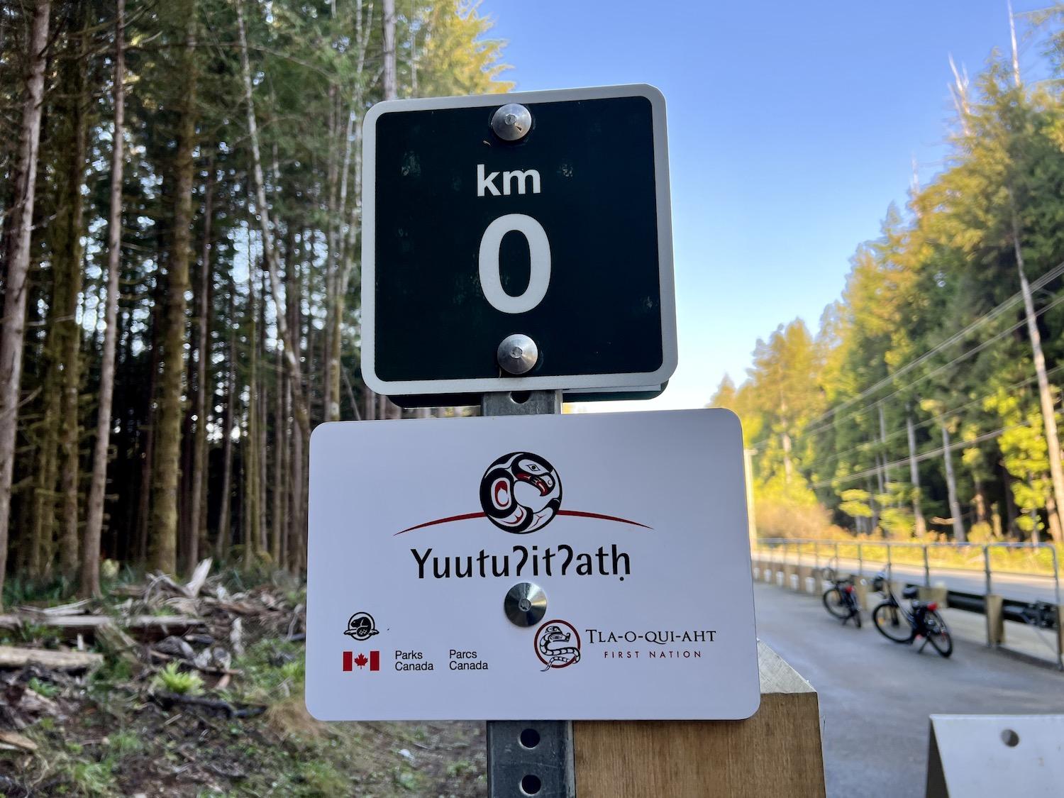 Signage along the multi-use path logs the kilometres and notes that it's in the traditional territories and homelands of two First Nations.