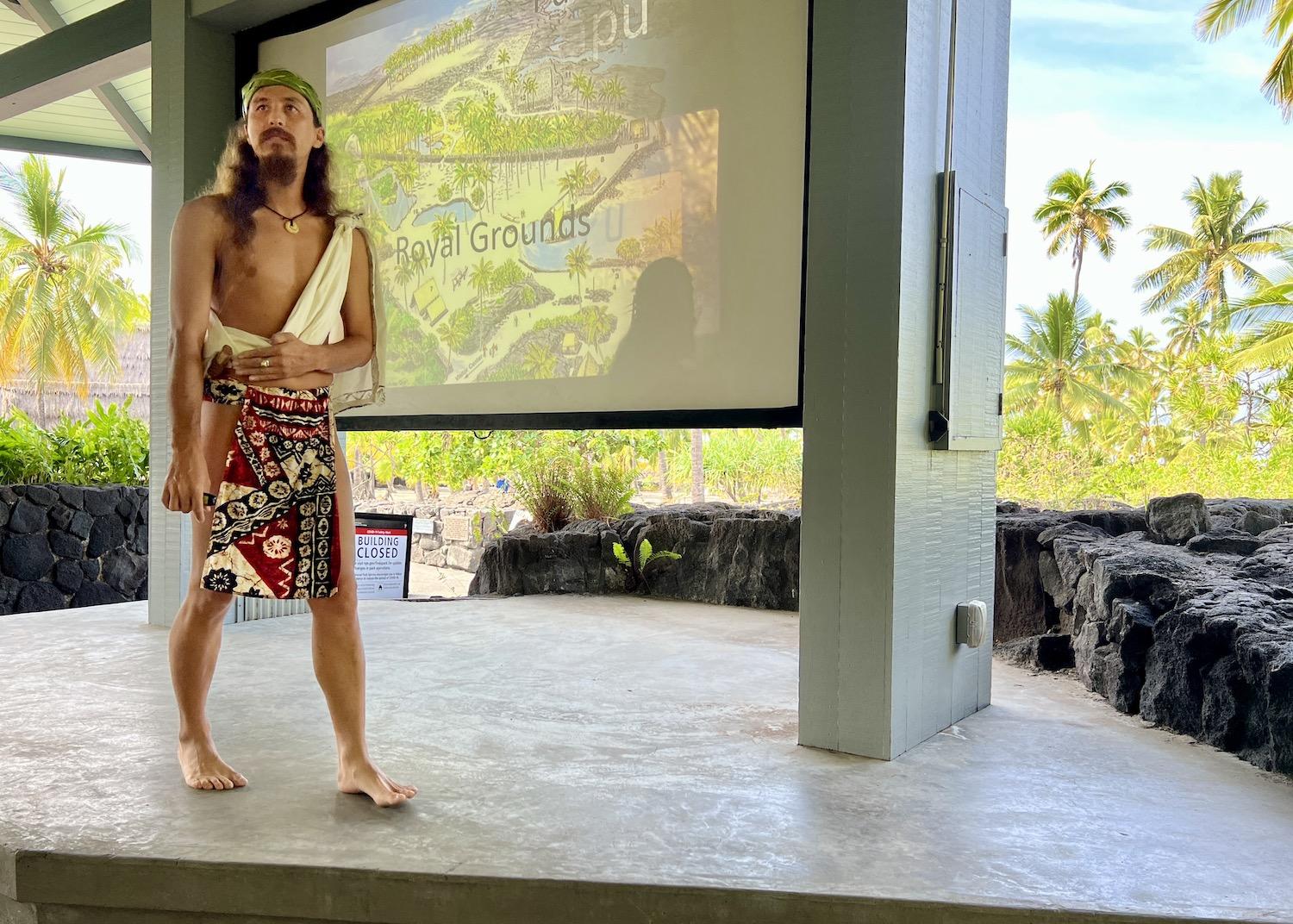 For a talk to students, interpretive ranger Kalā Holiday wears a traditional loincloth.