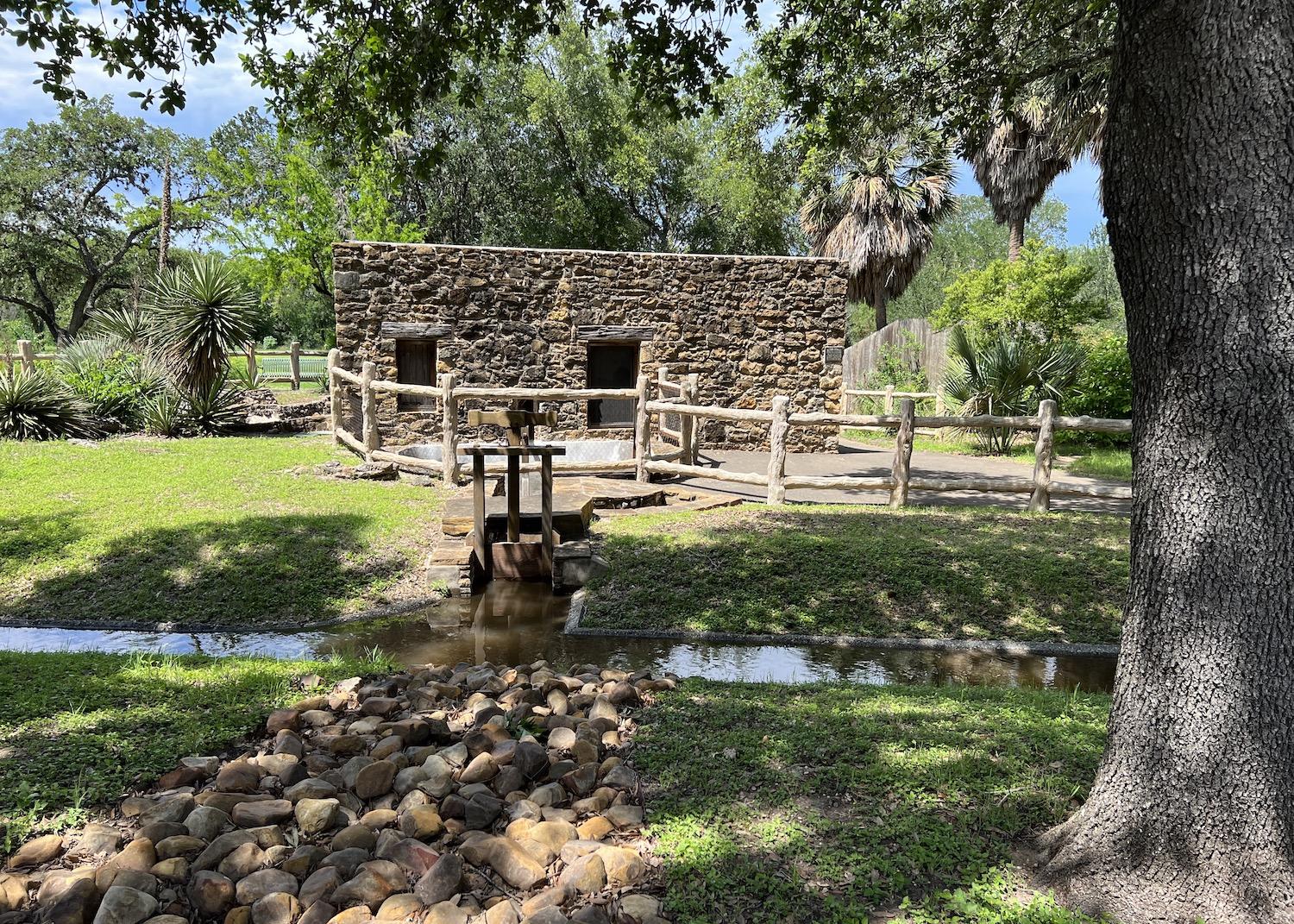 Behind the iconic church at Mission San José is the oldest grist mill in Texas and an acequia that's now on a closed-pump system so people can see how it works.