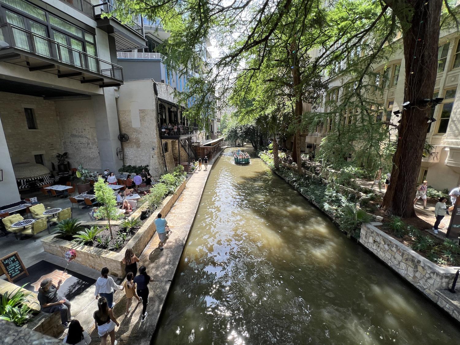 The downtown stretch of the San Antonio River Walk is marked by restaurants and boat tours.