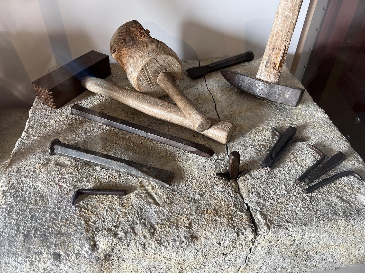 Quarrying and finishing tools are on display at St. Andrew's Rectory.