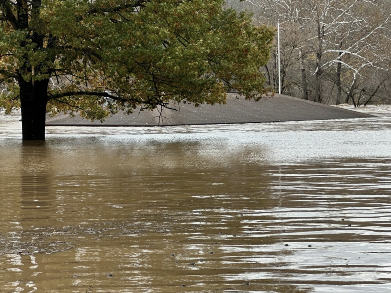 Flood waters reached the roof of the Pulltite ranger station / NPS