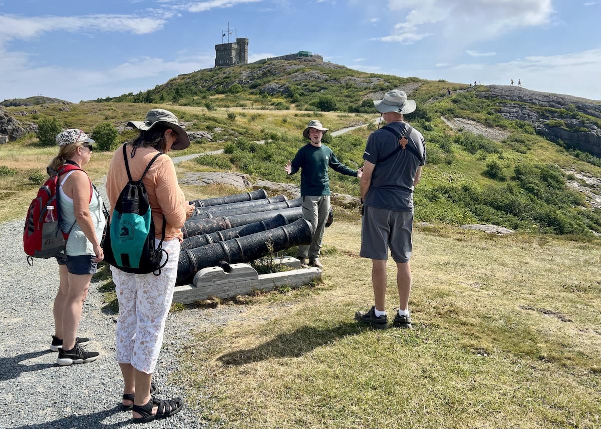Heritage presenter James Dinn leads a tour through Signal Hill from the Queen's Battery Barracks up to Cabot Tower.