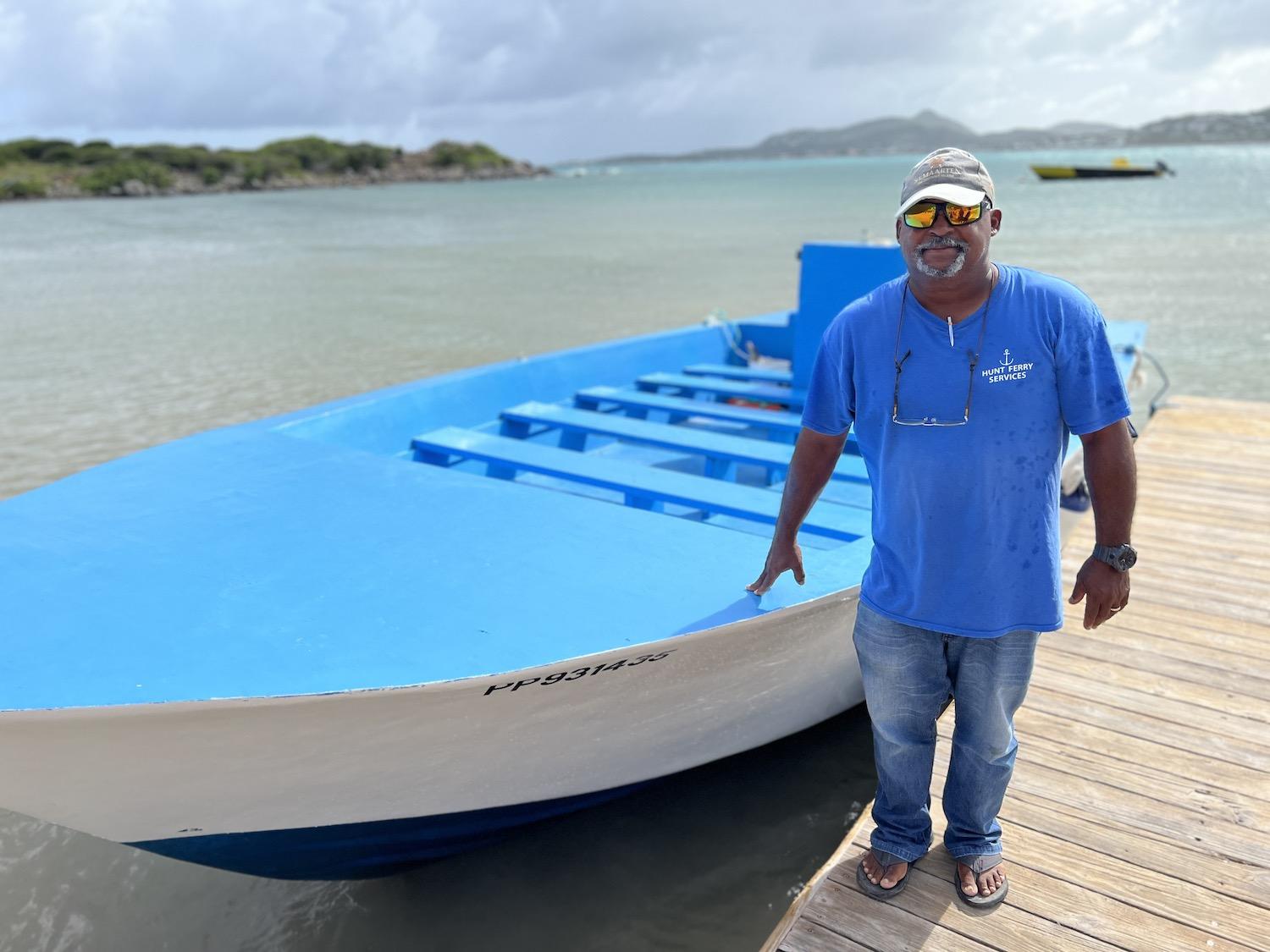 Mike Hunt is one of the captains who ferries people over to Pinel Island, a protected part of St. Martin.