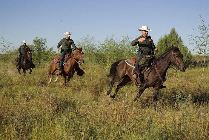 Border Patrol agents on horseback/U.S. Customers and Border Protection