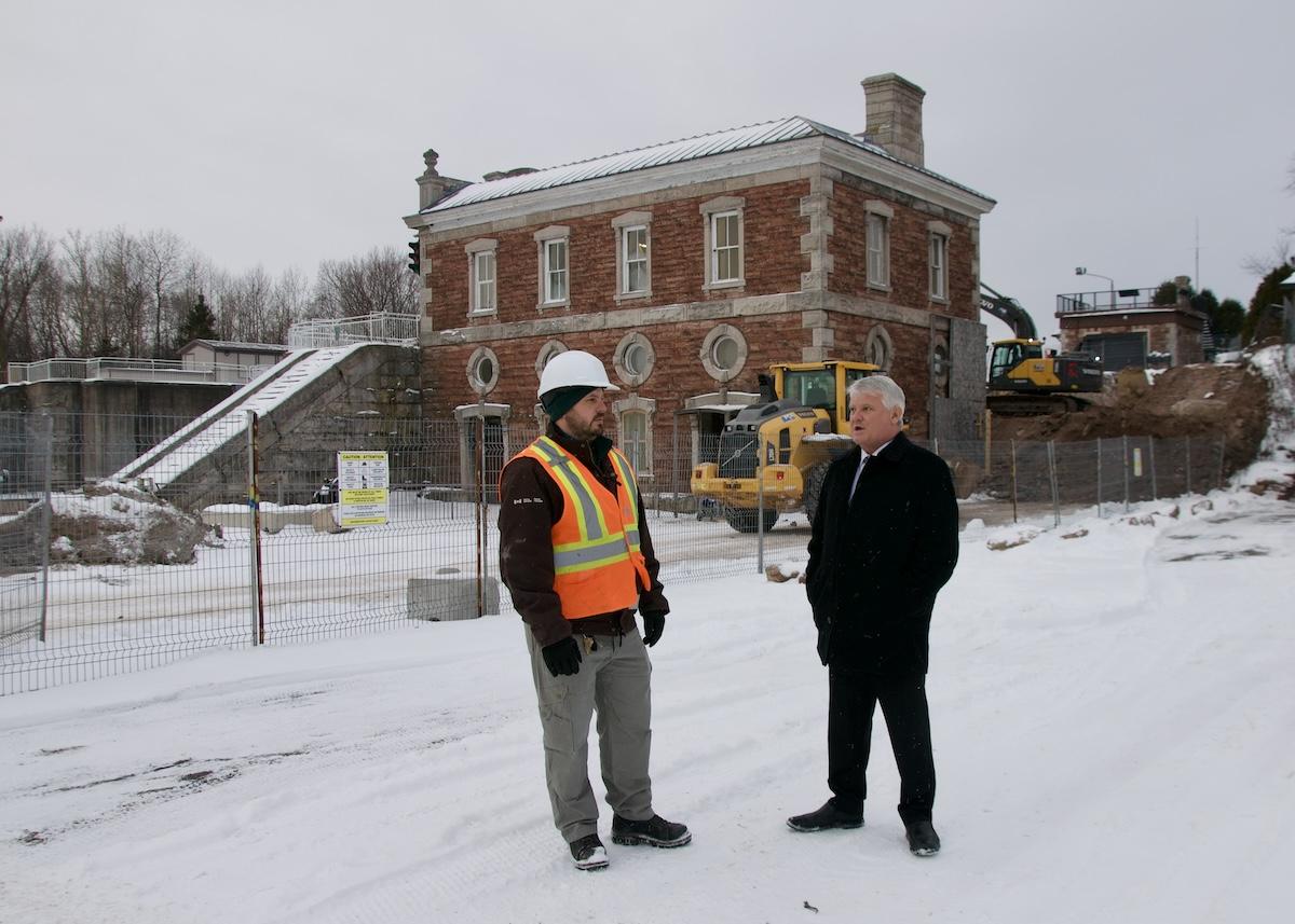 Shown at the Powerhouse building site at the Sault Ste. Marie Canal National HIstoric Site are (from left): Parks Canada Technical Services Officer Brendan Hodgson and Terry Sheehan, Member of Parliament for Sault Ste. Marie.