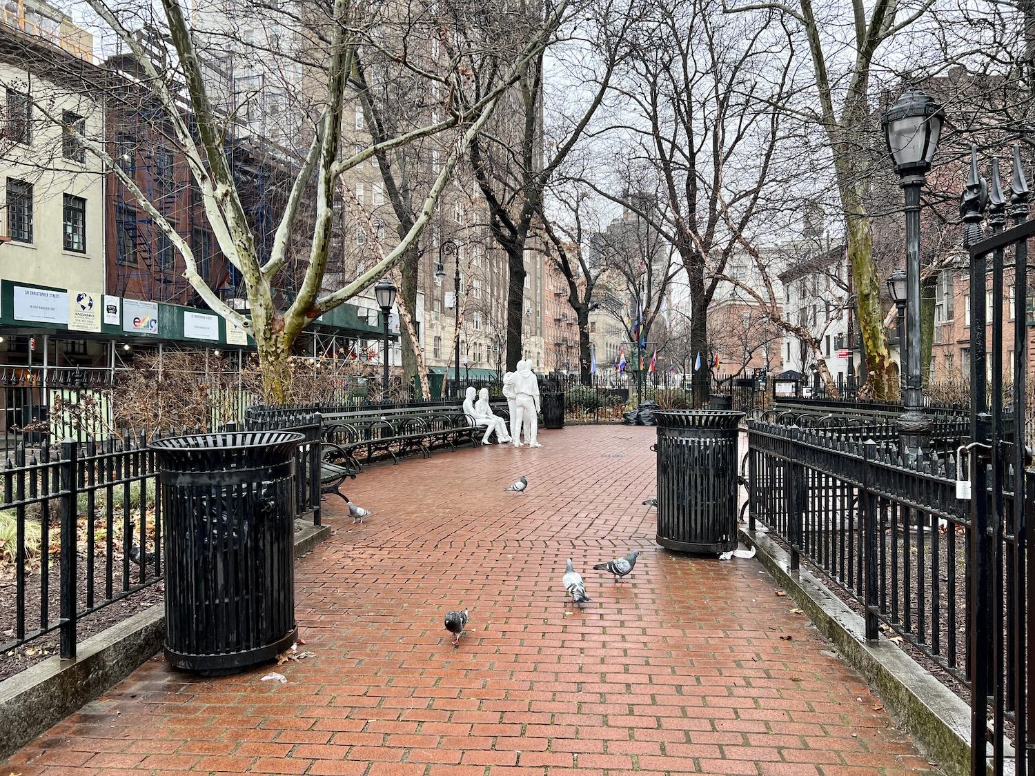 Stonewall National Monument is full of benches (and sometimes pigeons). George Segal's sculpture Gay Liberation is a focal point.