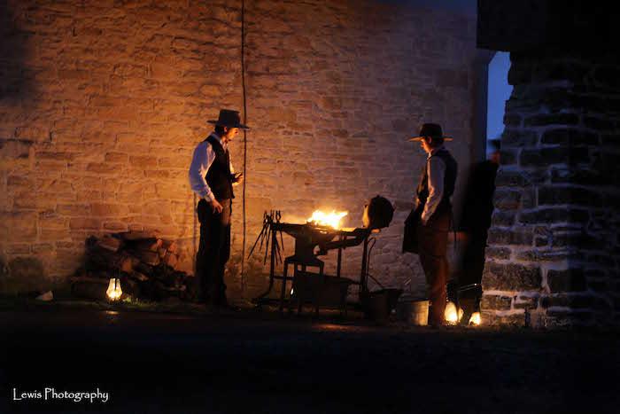 Cowboys working hot metal to make quick repairs/Terri Lewis Cowboys working hot metal to make quick repairs/Terri Lewis
