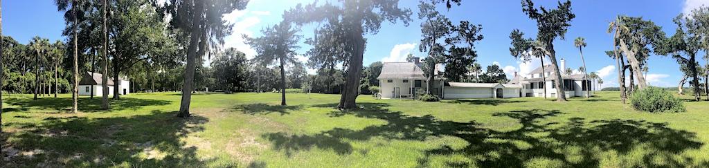 Panorama of Kingsley Plantation barn, kitchen house, and planter's house.