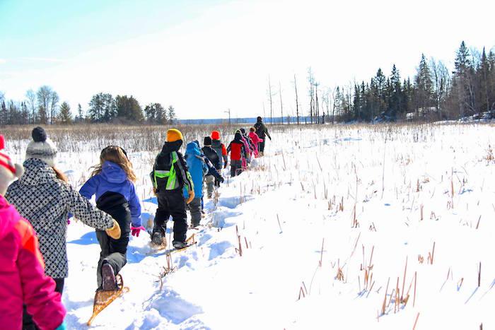 Winter is a season to get out and explore and try new things. Snowshoeing in Voyageurs National Park is just one aspect of the environmental education programs there / NPS