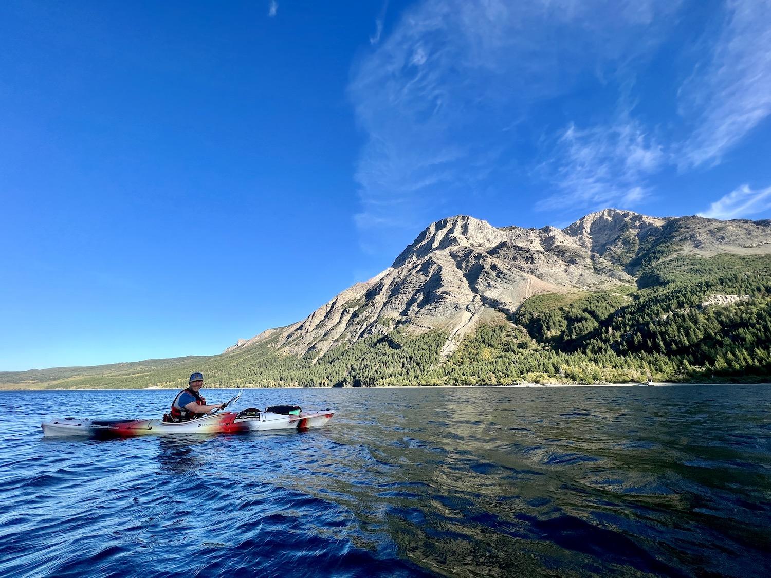 Carey Tetzlaff, lead guide with Tamarack Outdoors in Waterton, kayaks on Middle Waterton Lake.