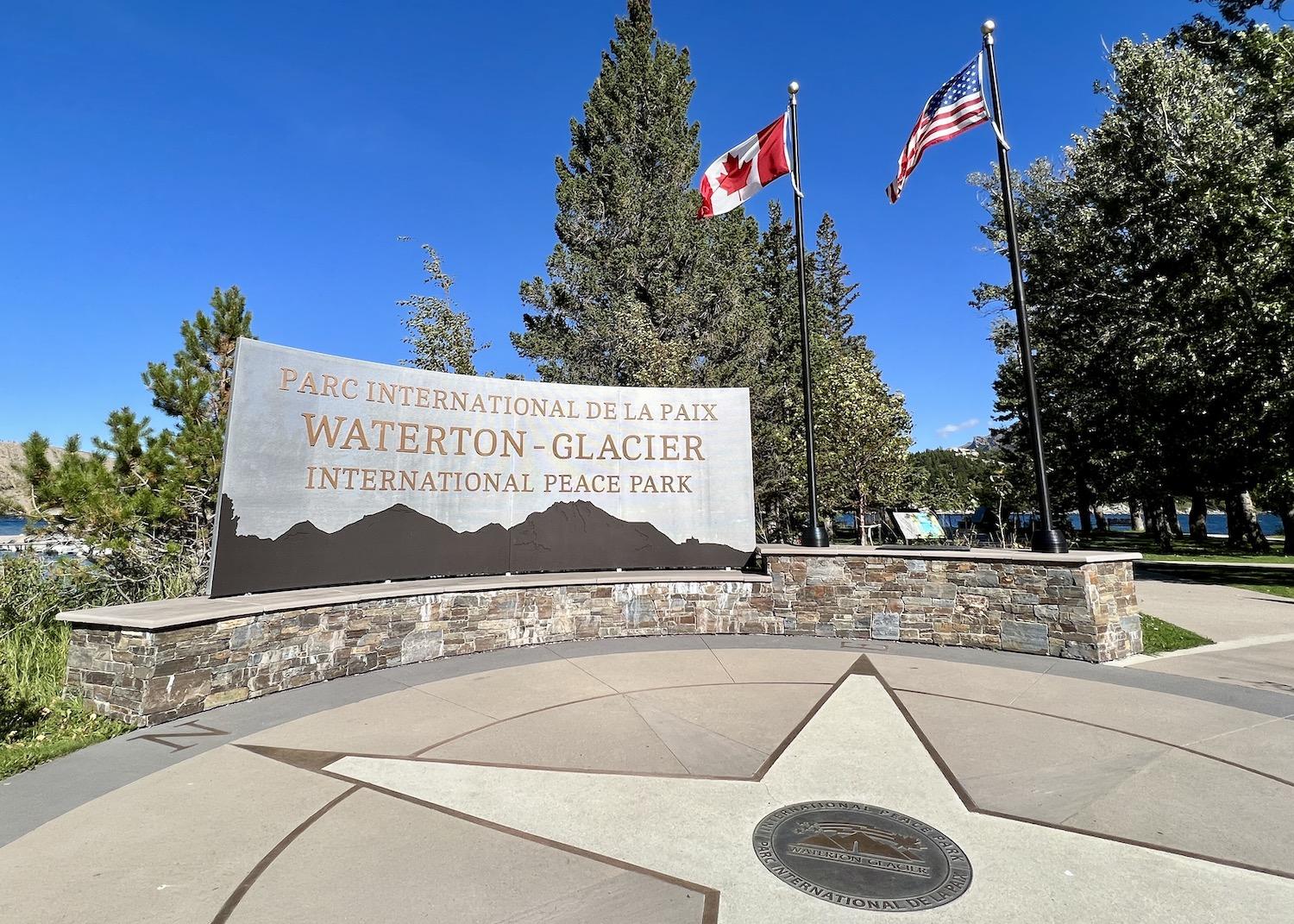 In Waterton's Peace Park Plaza, the Waterton-Glacier International Peace Park is marked by a grand entrance and a UNESCO World Heritage Site plaque.