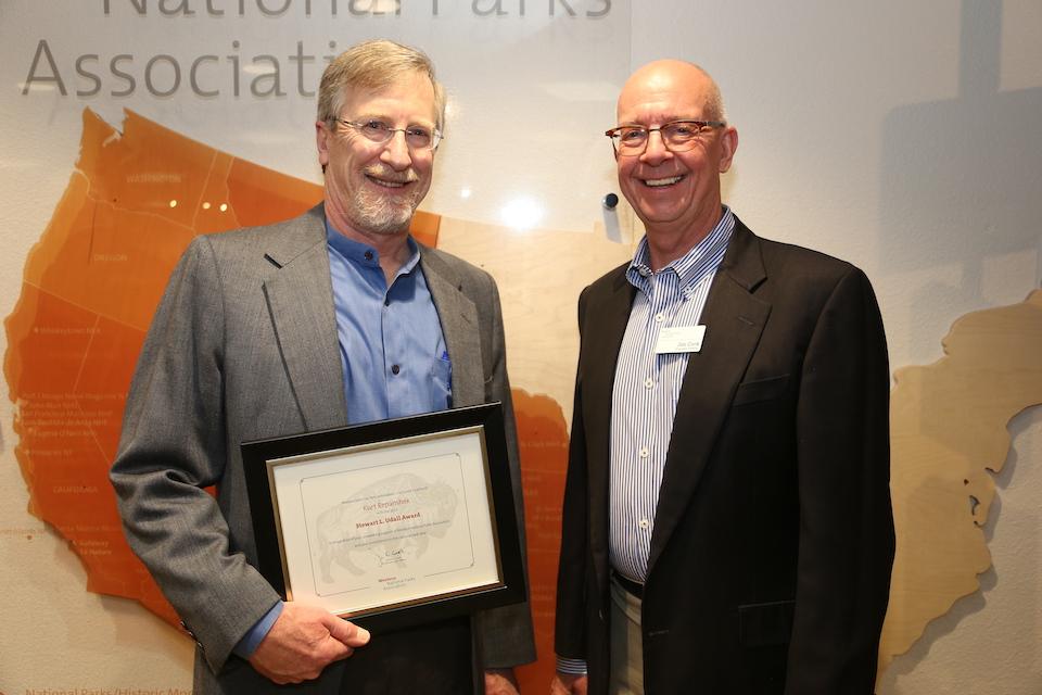 WNPA Executive Director Jim Cook presented Traveler founder Kurt Repanshek with the group's Stewart L. Udall Award