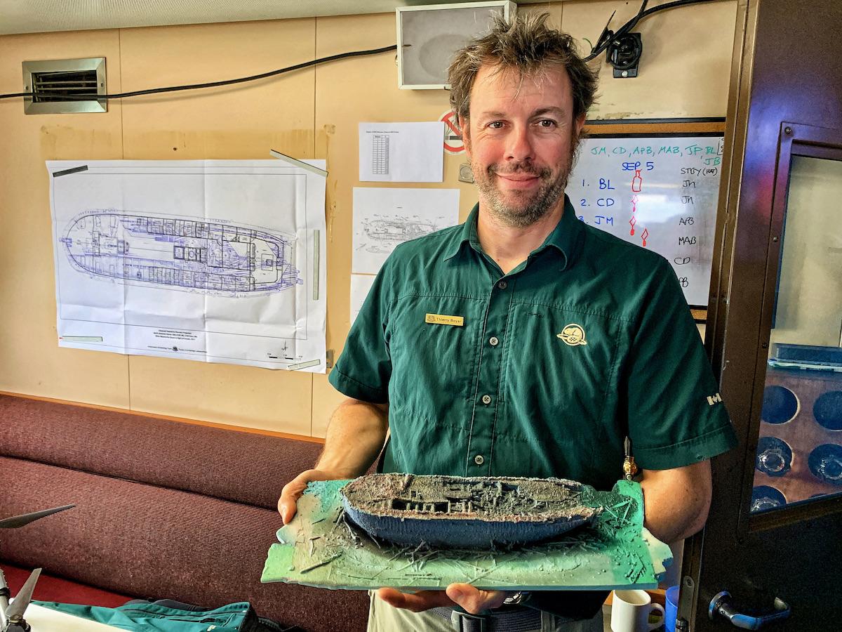 Parks Canada underwater archaeologist Thierry Boyer shows a model of HMS Erebus.