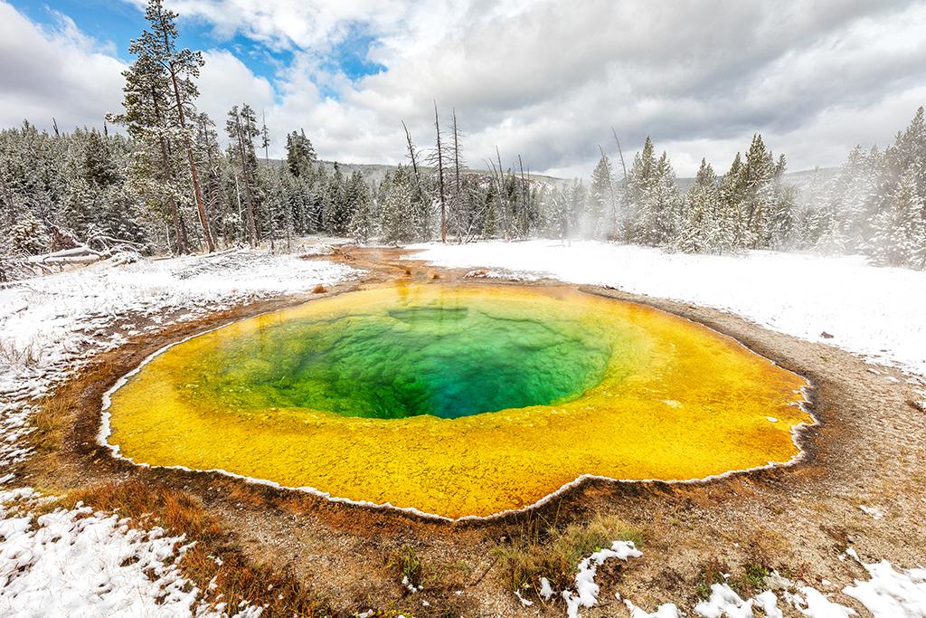 The beauty of Morning Glory Pool on a snowy autumn morning, Yellowstone National Park / Rebecca Latson