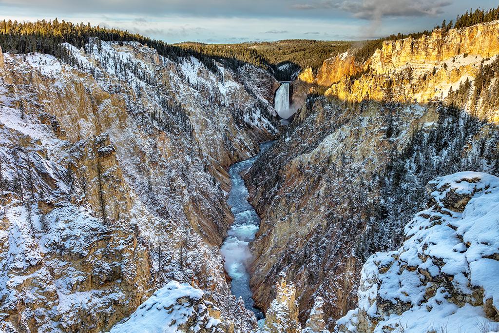 Sunrise over the lower falls of the Yellowstone River, Yellowstone National Park / Rebecca Latson