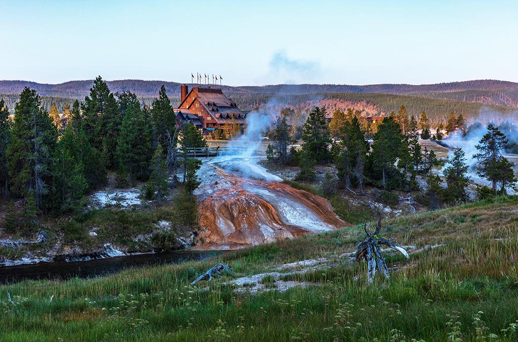 Old Faithful Inn and surrounding scenery, Yellowstone National Park / Rebecca Latson