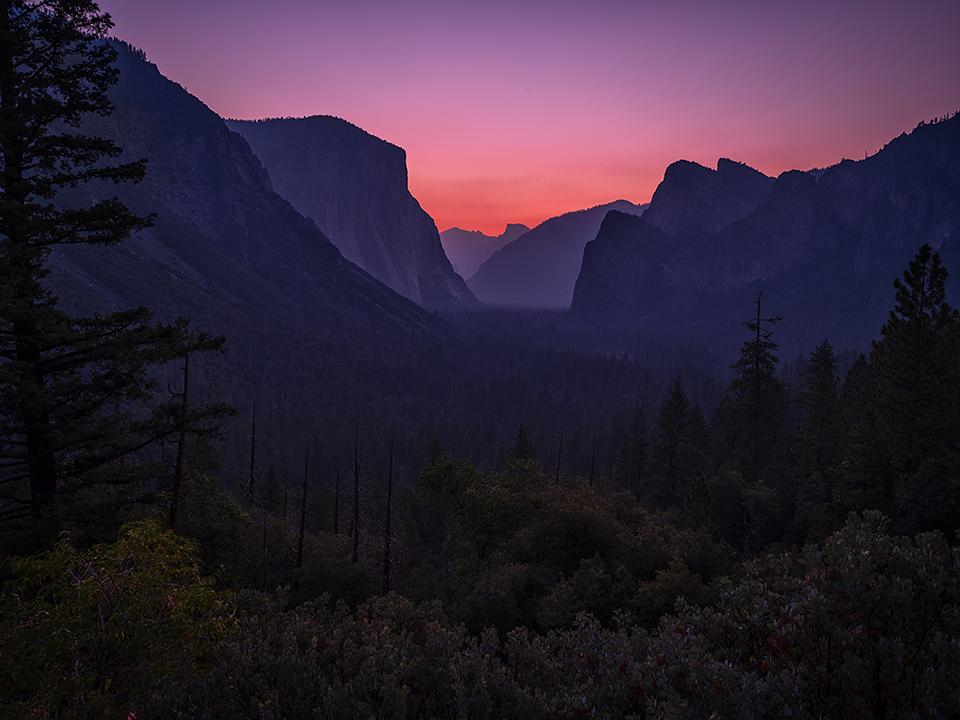 A saturated hazy sunrise at Tunnel View, Yosemite National Park / Rebecca Latson