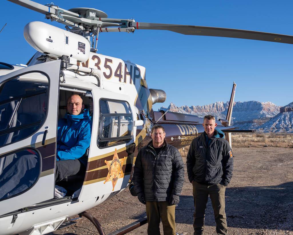 Department of Public Safety Aero Bureau (L to R) Rescue Specialist Hall, Pilot Charney, and Hoist Operator Curtis after a successful rescue in Zion. NPS Image / Jonathan Shafer